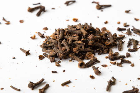 dried cloves spice herb on white tableの写真素材