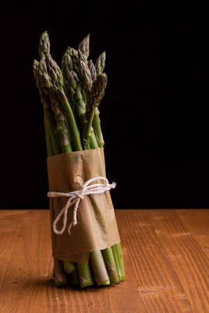 natural organic healthy green asparagus on wooden tableの写真素材