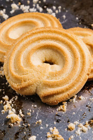Fresh tasty danish butter cookies on steel plate
