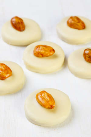 Assortment of delicious chocolate pralines on white tableの写真素材