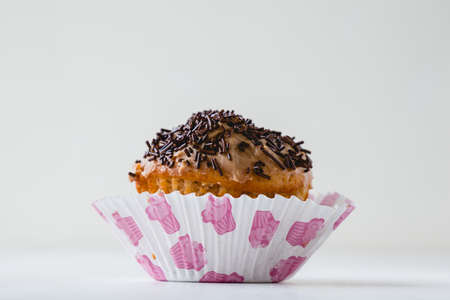 one home made chocolate cupcake on tableの写真素材