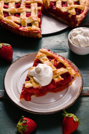 slice of fresh tasty strawberry pie with cream