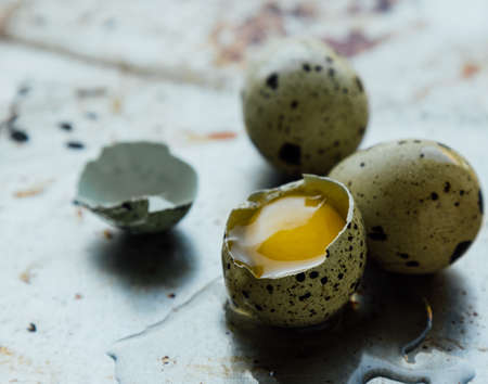 close up of healthy small raw quail eggsの写真素材
