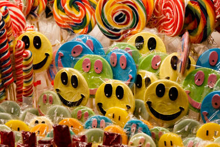 abundance of color candys with smiling face designの写真素材