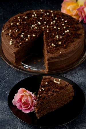 Sweet dark brown chocolate cake with decorationの写真素材