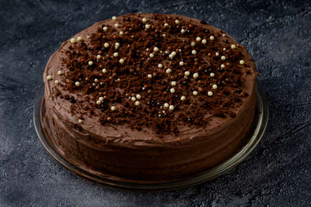 Sweet dark brown chocolate cake with decorationの写真素材