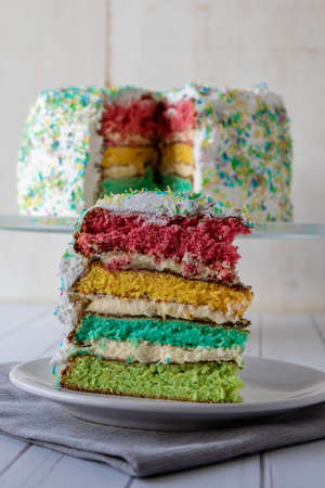 colorful rainbow cake dessert with colored layersの写真素材