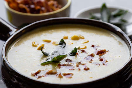 corn cream soup with bacon and sageの写真素材