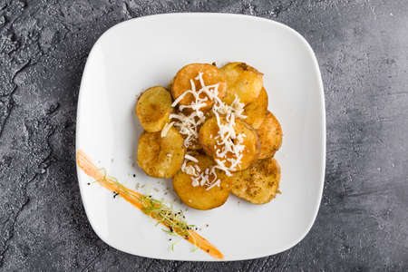 fresh healthy baked delicious baked potato on white plateの写真素材