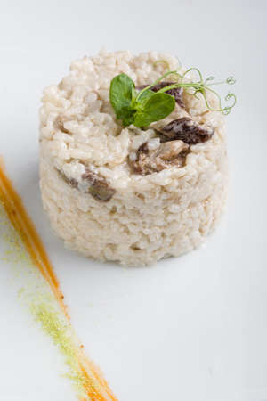 cooked tasty rice portion on white plateの写真素材