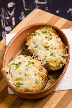 fresh healthy baked delicious baked potato on white plateの写真素材