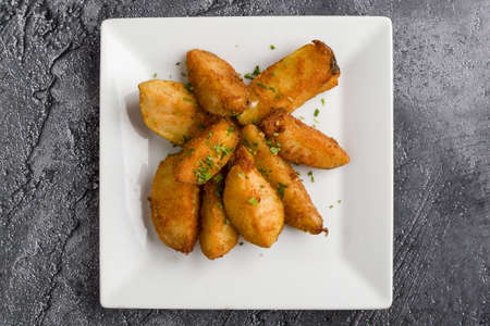 fresh healthy baked delicious baked potato on white plateの写真素材