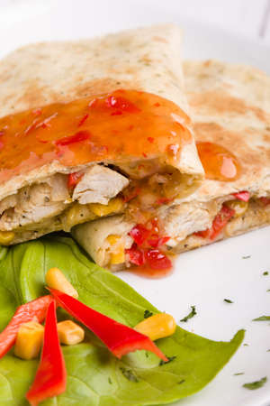 tasty fresh quesadilla with chicken meat and vegetablesの写真素材