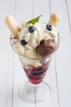 fresh sweet refreshing ice cream sundae in glassの写真素材