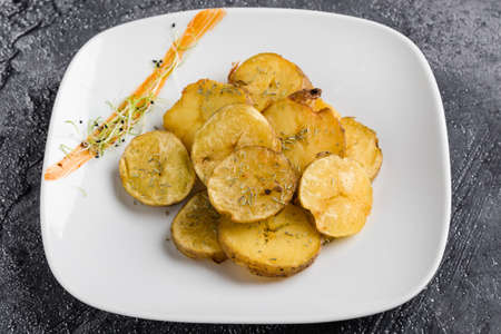 fresh healthy baked delicious baked potato on white plateの写真素材