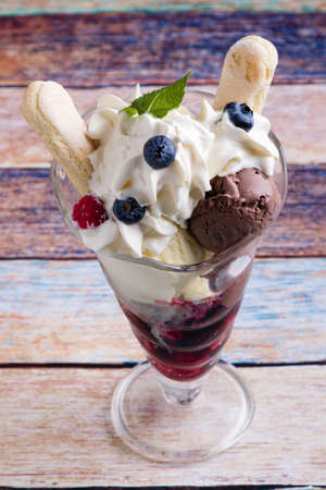 fresh sweet refreshing ice cream sundae in glassの写真素材