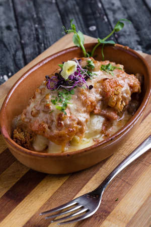tasty delicious fried chicken schnitzel in restaurant settingの写真素材