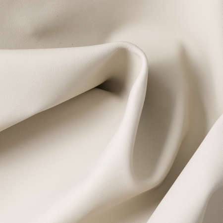 Closeup of light color leather material texture backgroundの写真素材