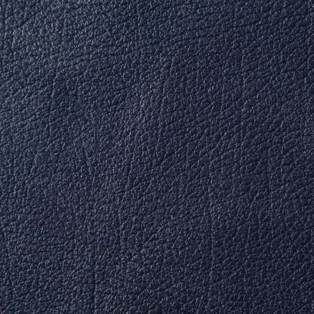 Closeup of dark color leather material texture backgroundの写真素材