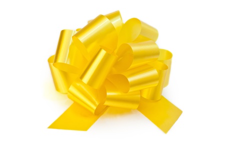 Golden decorative bow on white backgroundの写真素材