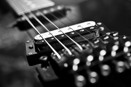 Fragment string electric guitar in black and white