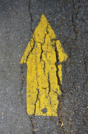 Arrow yellow on the street