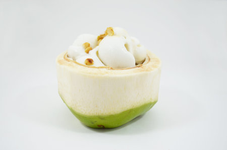 Ice-cream in coconut isolated on white backgroundの写真素材