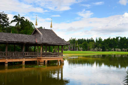 old pavilion at lake, thailandの写真素材
