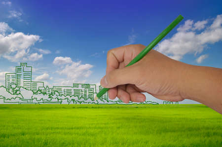 hand drawing city on fieldの写真素材