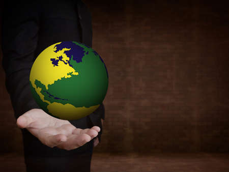 hand holding brazil theme earthの写真素材