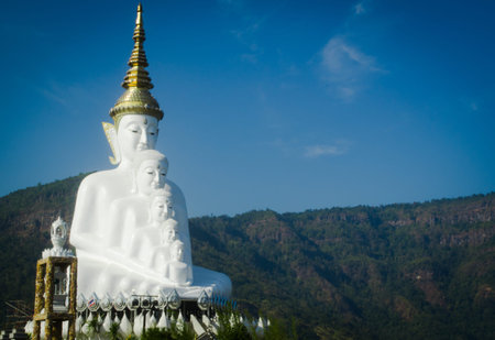 White Buddha statue with the golden crown, North of Thailandの写真素材