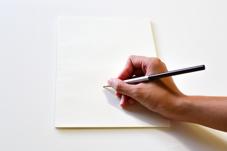 blank notebook with yellow clipboard pencil Thailandの写真素材