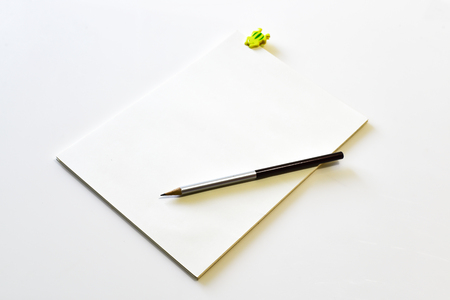 blank notebook with yellow clipboard pencil Thailandの写真素材