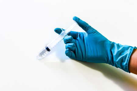 Syringe and Glove with use for medical injectionの写真素材