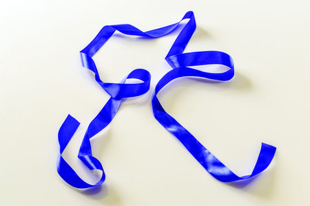 Blue ribbon isolated on the white background