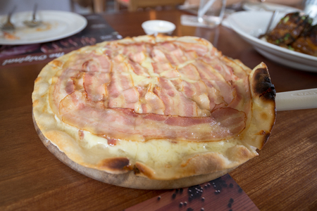 Bacon Pizza baked by stove, Italian food with Thai styleの写真素材