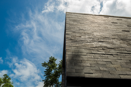 Building Wall exterior with the spacing sky as a background for insert text
