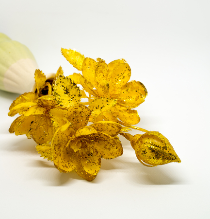 Golden lotus flower for prey in Buddhism was isolated in the white backgroundの写真素材
