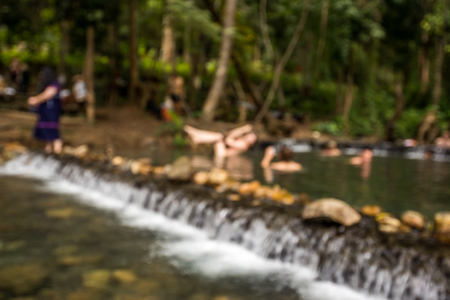 More People swimming in the Pool of Waterfall in National Park, Blurred abstract Pictureの写真素材