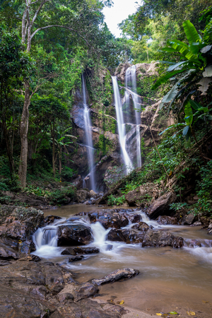 Water flow from high to low point of the river, Mok Fa waterfall in the national park in Thailandの写真素材