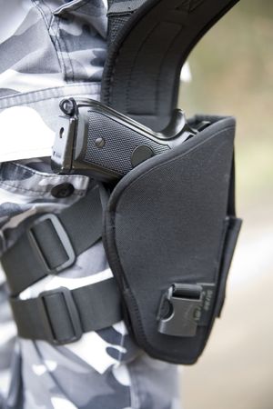 gun holster with a 9mm weapon insideの素材 [FY310736787]