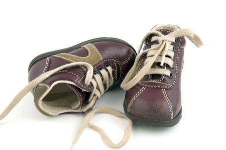 pair of kid's shoes isolated on white backgroundの写真素材