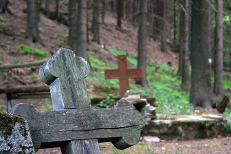 wooden cross on old german cemetery in Gluszyca (Poland)の写真素材