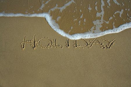 holiday inscription on the beachの写真素材