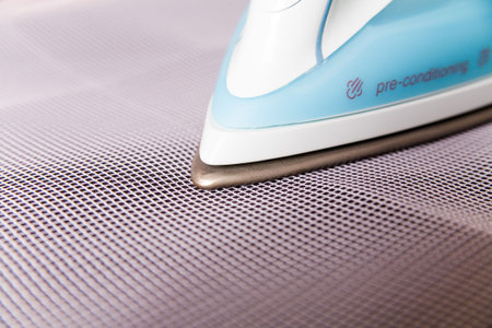 ironing the suit through a special fabric