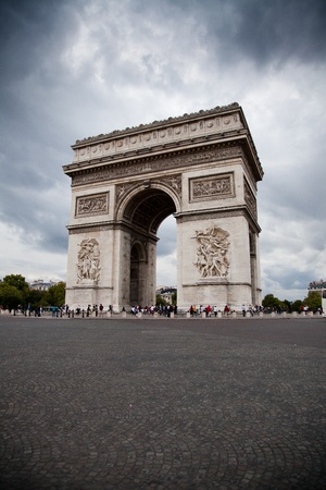 Arc de Triomphe (Arch of Triumph) on gloomy sky backgroundのeditorial素材