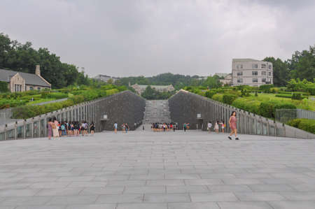 SEOUL, SOUTH KOREA - AUGUST 2012 - Ewha Womans University view of modern Campus Complex (ECC) building by french architect Dominique Perrault Architecture.のeditorial素材