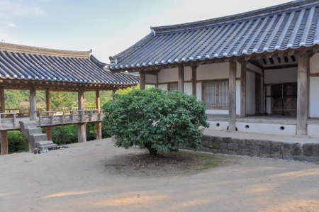 Korean Confucian Academy from Joseon Dynasty era. Courtyard with small tree western dormitory and pavilion. Byeongsan Seowon, Andong, South Korea.のeditorial素材