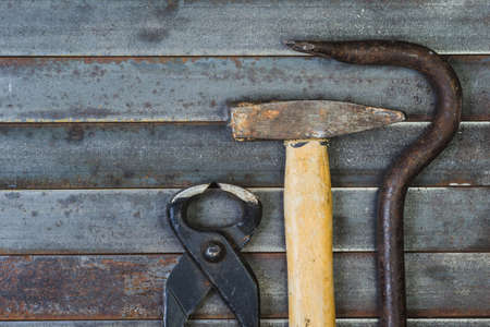 Set of various equipment, instruments and tools for manual work with copy space, carpenter tool old rusty metal background.の写真素材