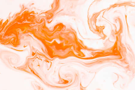 Artistic abstract design created with mixing color liquids. Colorful background texture. Liquids mixing on water surface.の写真素材